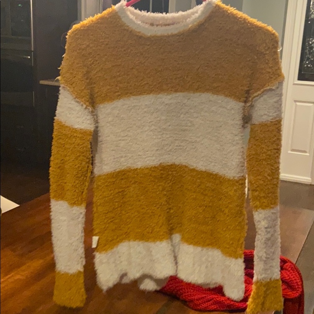 white and yellow sweater